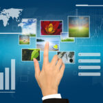 Business Hand touches the flow of images